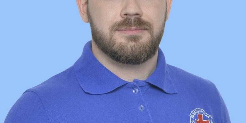 Учитель в белом халате